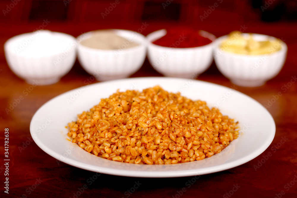 Cooked oatmeal with delicious tomato sauce ready to serve Cooked oatmeal with delicious tomato sauce ready to serve