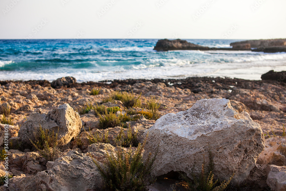 Sea coast with vvolcanic rocks in Cyprus