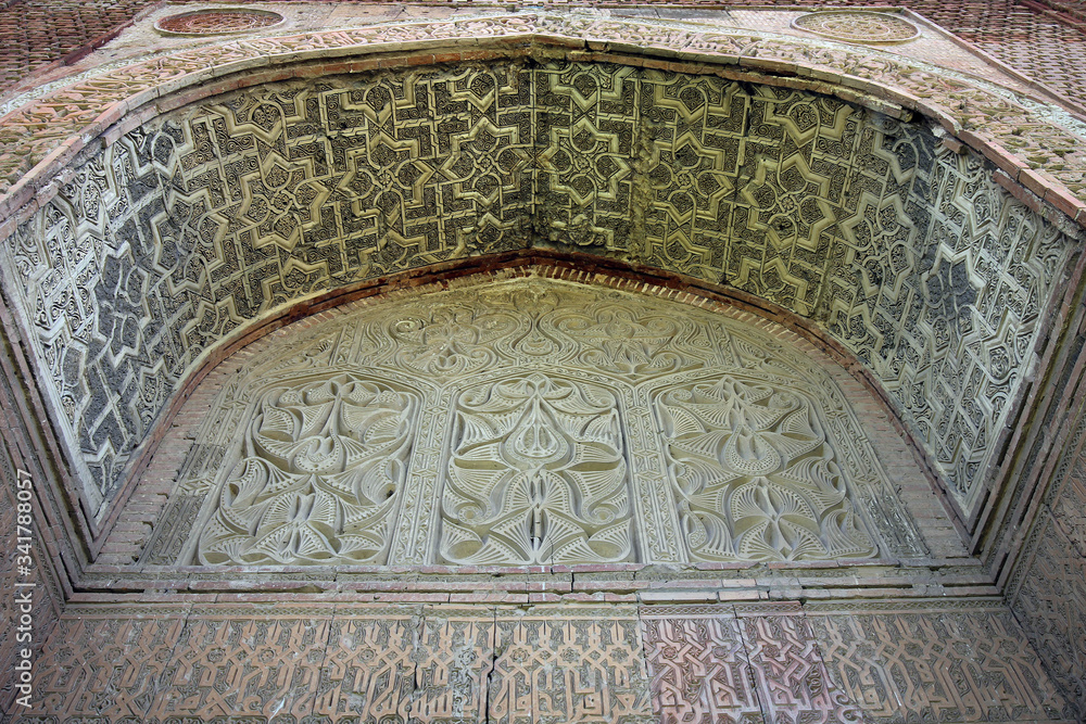 Stone carving masterpiece view of Uzgen mausoleum, Kyrgyzia