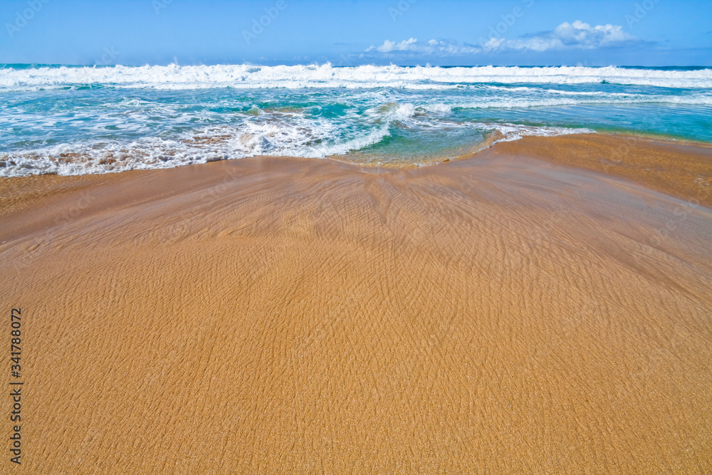 Queen's Pond Draining Into The Pacific Ocean at Low Tide on Polihale Beach, Polihale Beach State Park, Kauai, Hawaii, USA Queen's Pond Draining Into The Pacific Ocean at Low Tide on Polihale Beach, Polihale Beach State Park, Kauai, Hawaii, USA
