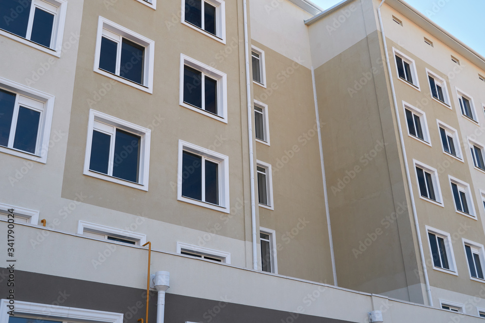 © soleg - facade of a new multi-storey building with many windows