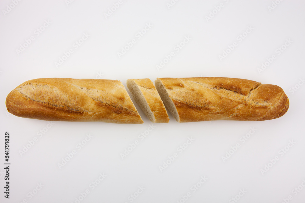 Freshly baked cut bread on a white background. For the presentation of food products, bread production and basic necessities. Freshly baked cut bread on a white background. For the presentation of food products, bread production and basic necessities.