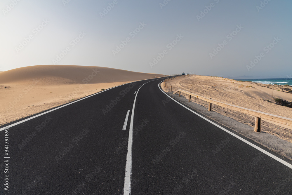 road in the desert dunes