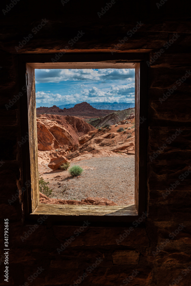 Fototapeta Framed View of The Eroded Sandstone Hills From The Cabins, Valley of Fire State Park, Nevada, USA