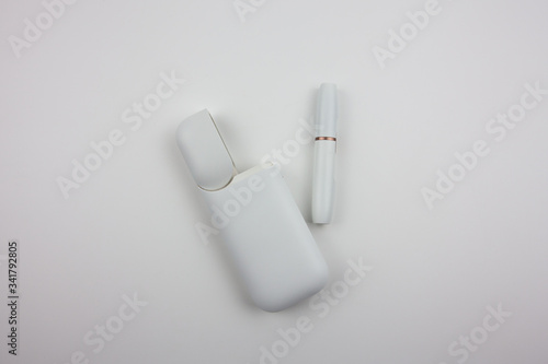 Electronic cigarettes in a white case. For the presentation of tobacco products and the work of the tobacco industry.