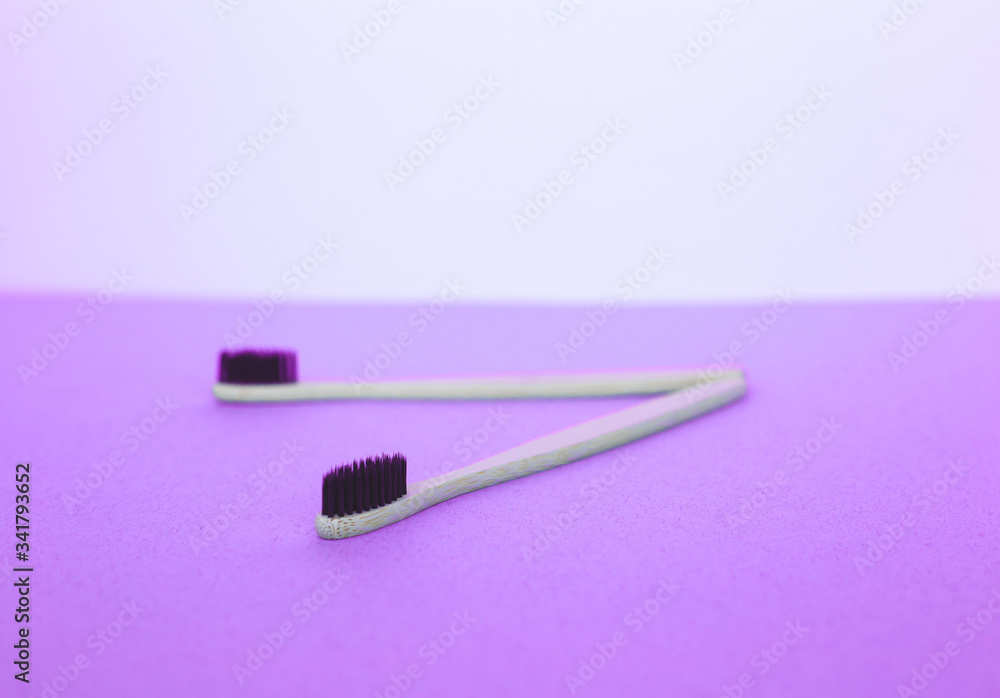 zero waste concept. bamboo toothbrushes on a white-blue background zero waste concept. bamboo toothbrushes on a white-blue background