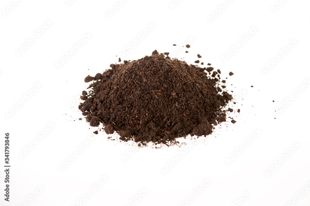 View of a pile of brown soil located on a white background View of a pile of brown soil located on a white background
