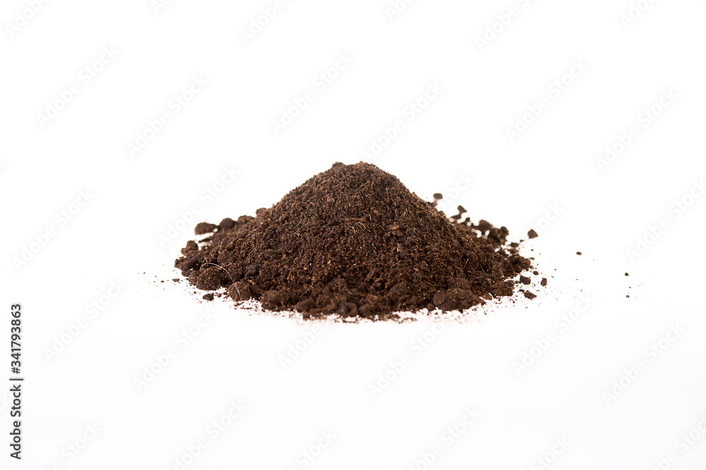 View of a pile of brown soil located on a white background View of a pile of brown soil located on a white background