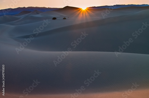 Sunrise Over The Mesquite Flat Sand Dunes at the Foot of the Armagosa Mountain Range, Death Valley National Park, California, USA