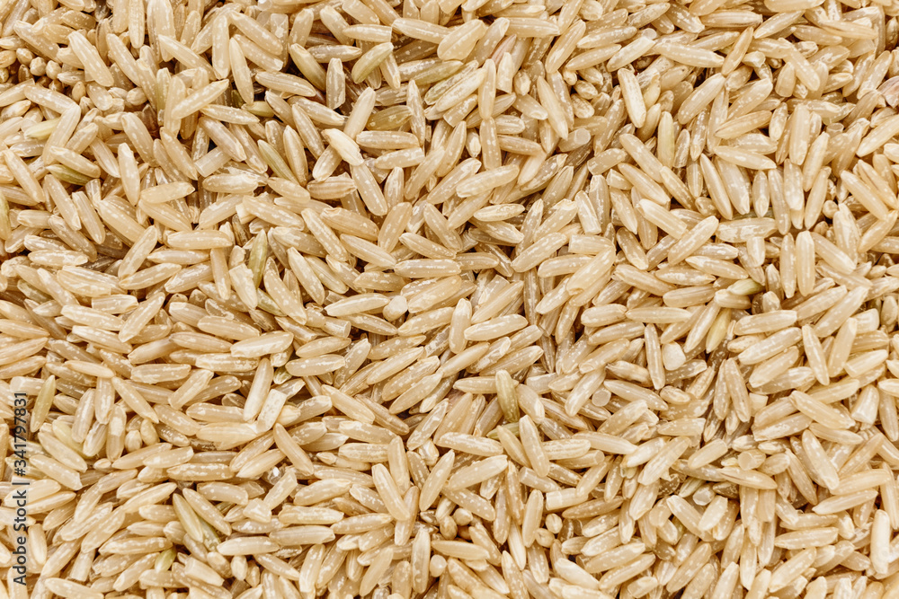 Brown healthy rice background. pattern texture, top view Brown healthy rice background. pattern texture, top view