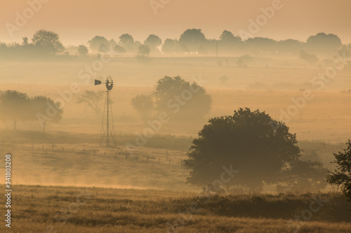Windmill On Hillside With Foggy Sunrise, Washington Coounty, Texas 77880