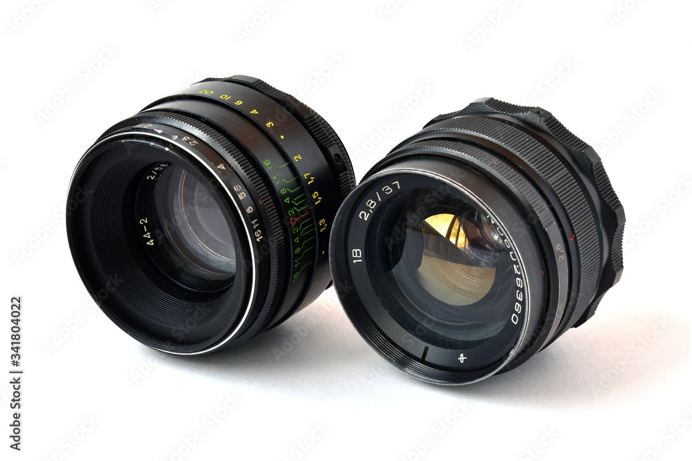 Fototapeta premium Old soviet photo lens on a white background. 