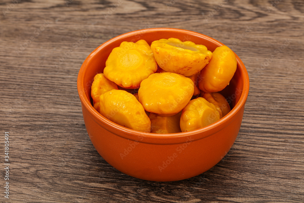 Marinated yellow patisson in the bowl Marinated yellow patisson in the bowl