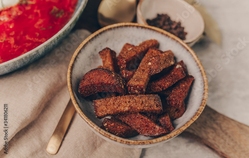 Fresh fried bread garlic sticks. Rustic style.