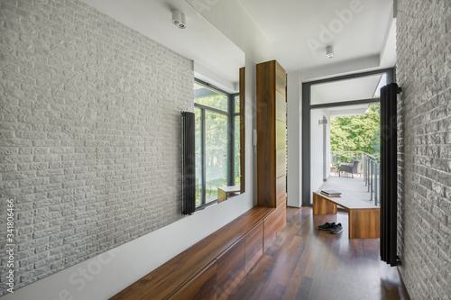 Home corridor with mirror wall