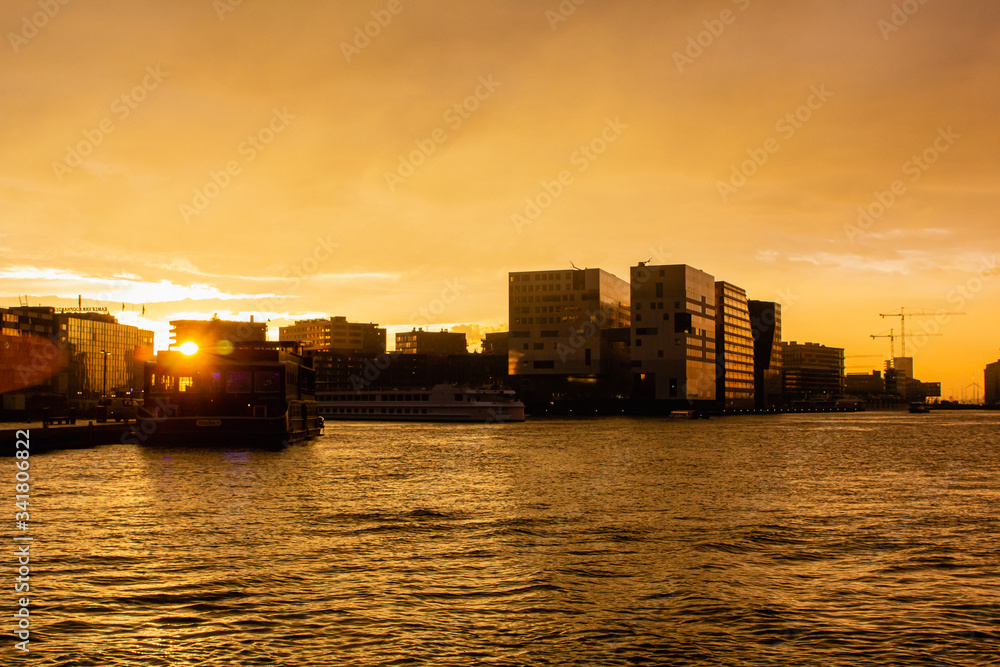 Spring sunset rain near Eye Film Museum in Amsterdam Spring sunset rain near Eye Film Museum in Amsterdam