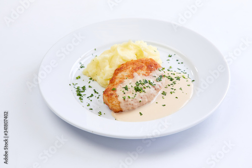 cutlet with mashed potato on the white background