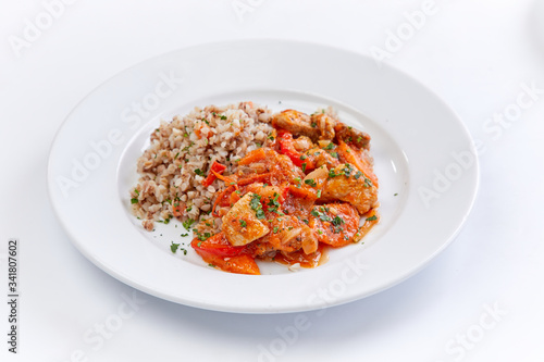 chicken with buckwheat on the white background