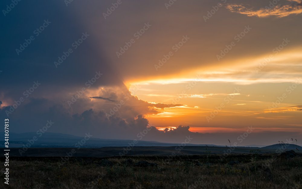 Steppe skyline and wonderful clouds at sunset Steppe skyline and wonderful clouds at sunset
