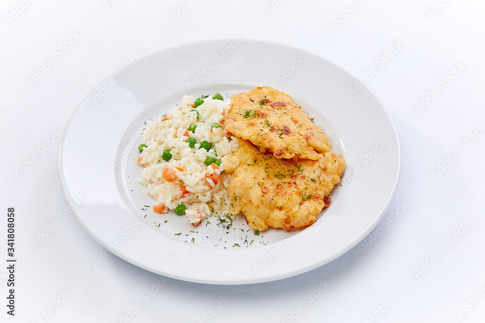 fried chicken breast with rice and vegetables on the white background fried chicken breast with rice and vegetables on the white background