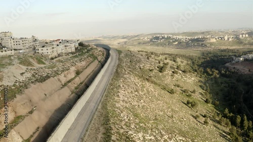 Security fence, East Jerusalem, Beit Hanina, Israel
Drone view over east Jerusalem security wall, 2020
 photo