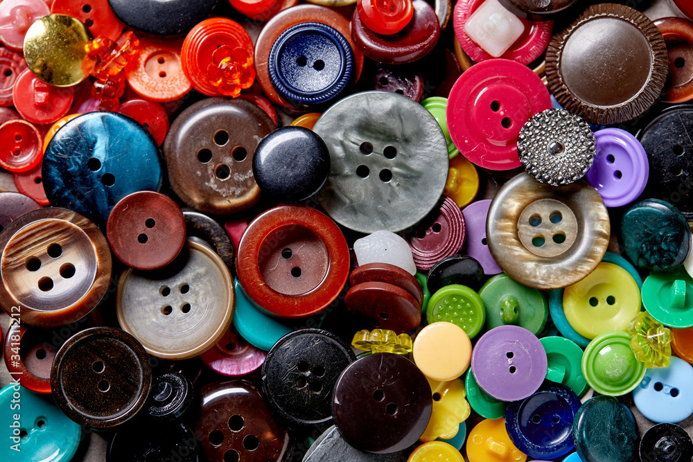 Background and texture of multicolored antique buttons Background and texture of multicolored antique buttons