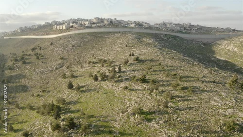 Security fence, East Jerusalem, Beit Hanina, Israel-aerial
Drone view over east Jerusalem security wall, 2020
 photo