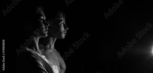 silhouette of a woman and man. Couple in love. Shadow. Black and white photo. Sensual. Couple love. 