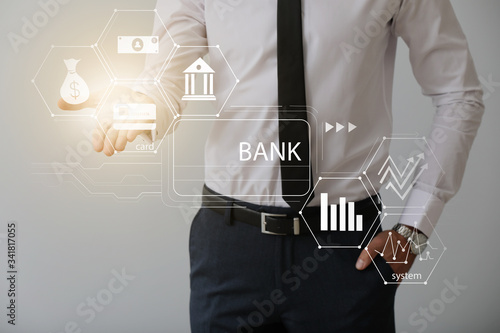 Male bank manager using vir...