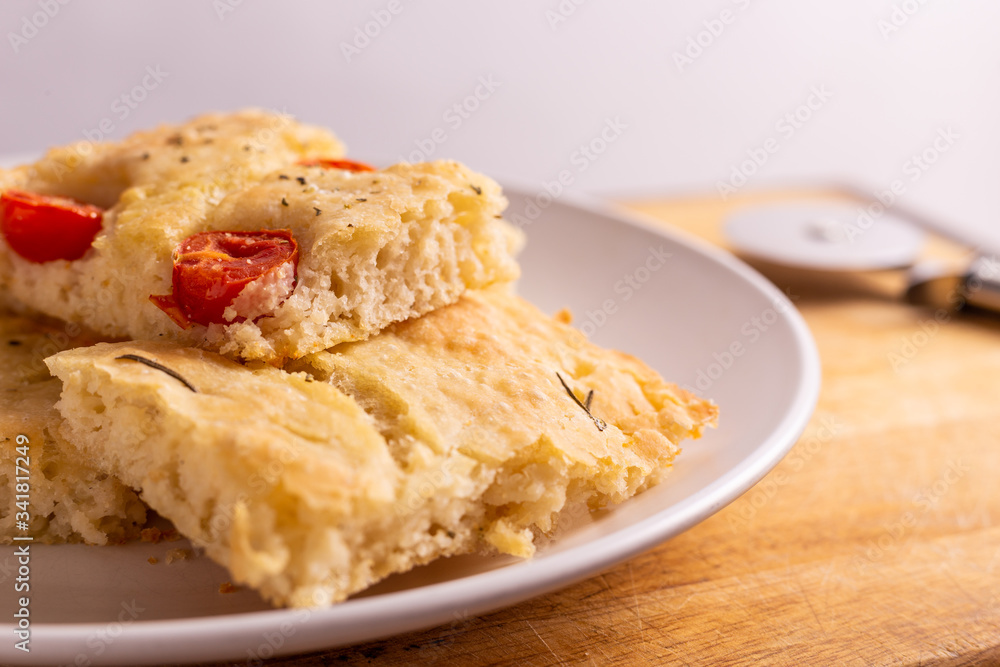 Slices of homemade focaccia, typical recipe from south italy. Slices of homemade focaccia, typical recipe from south italy.