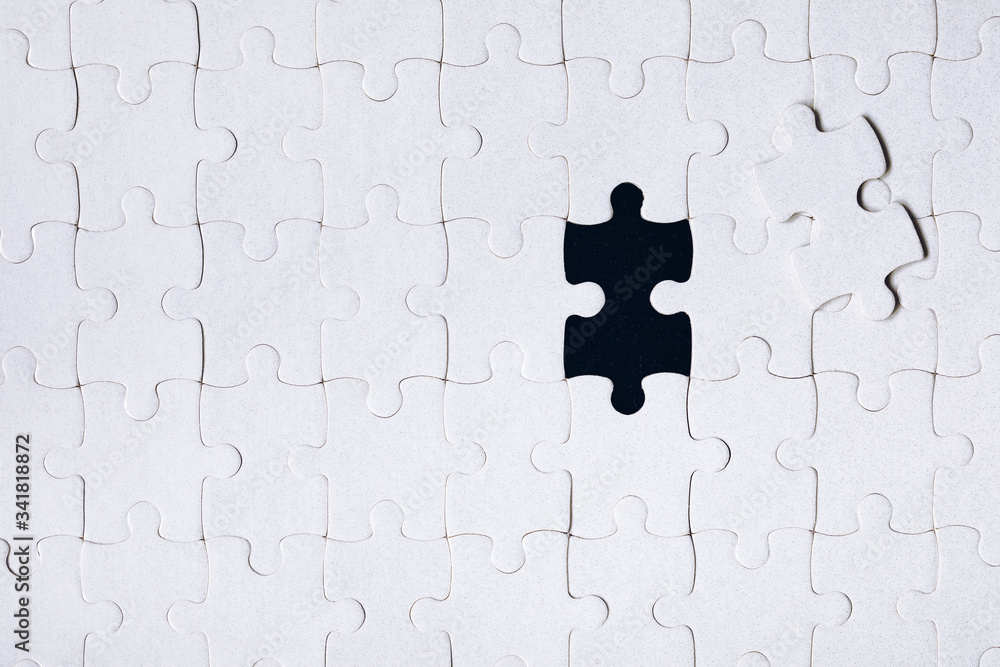 Jigsaw puzzle with missing piece. Missing puzzle pieces. Concept image of unfinished task