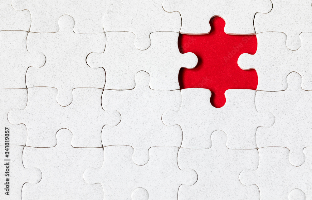 Jigsaw puzzle with missing piece. Missing puzzle pieces. Concept image of unfinished task. Completing final task, missing jigsaw puzzle pieces and business concept with a puzzle piece missing. Jigsaw puzzle with missing piece. Missing puzzle pieces. Concept image of unfinished task. Completing final task, missing jigsaw puzzle pieces and business concept with a puzzle piece missing.