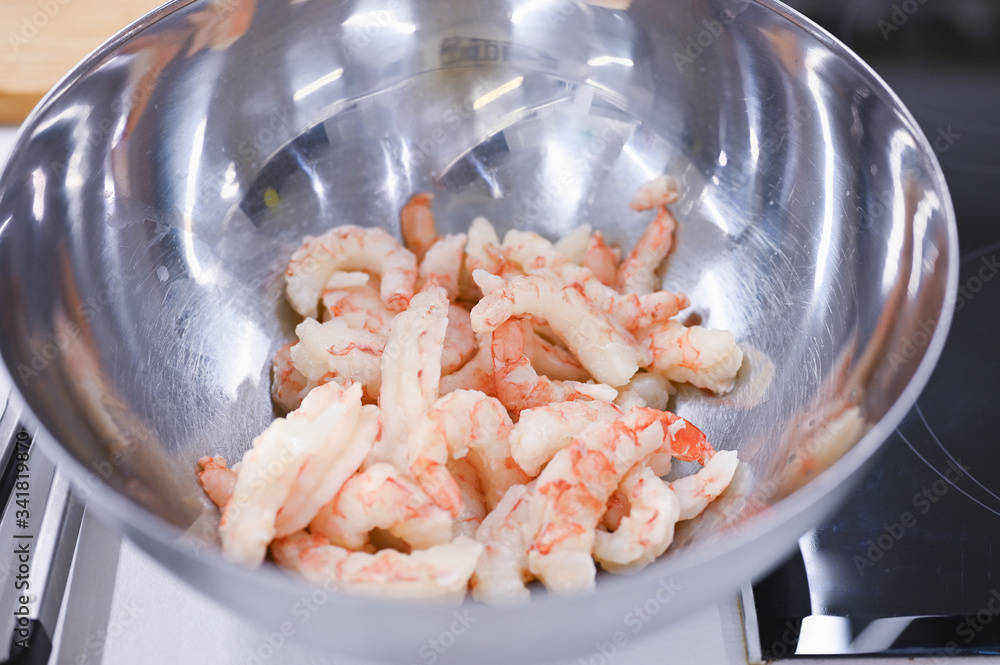 king prawns in a metal bowl. Different boiled shrimps in the stainless steel sieve. king prawns in a metal bowl. Different boiled shrimps in the stainless steel sieve.