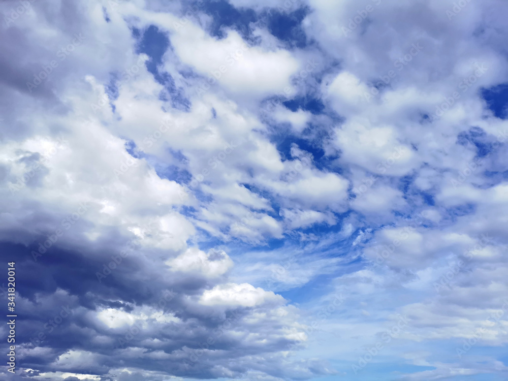 cumulus clouds on a background of blue sky in clear weather cumulus clouds on a background of blue sky in clear weather
