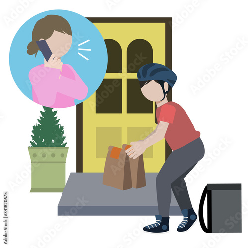 玄関先に荷物を置くデリバリー業者の男性