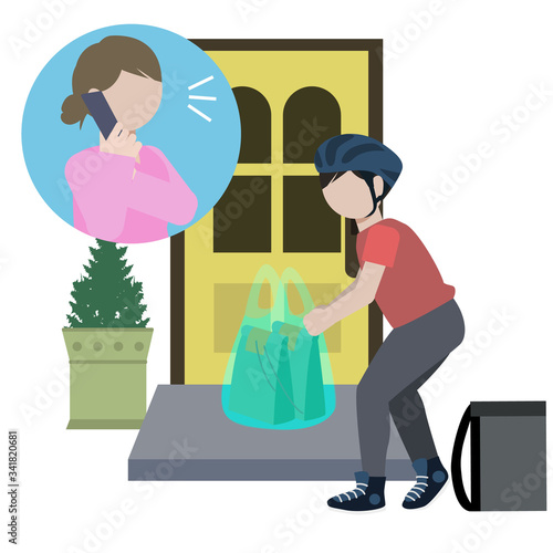 玄関先に荷物を置くデリバリー業者の男性