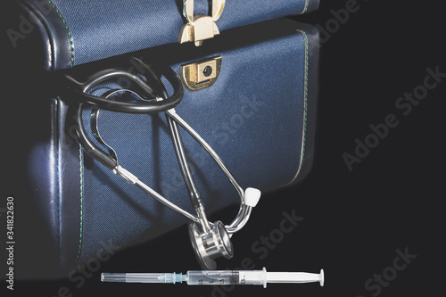 medical stethoscope and syringe