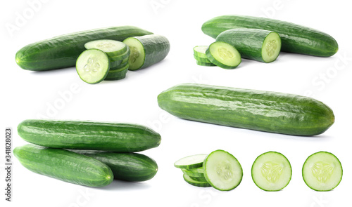 Set with sliced cucumbers on white background