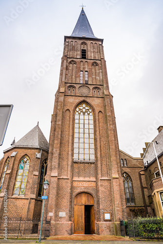 January 10, 2020. H. Aartsengel Michael kerk - Church by the water canal in winter photo