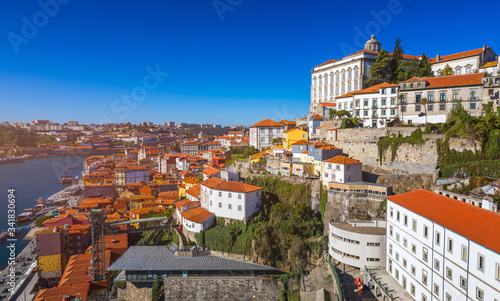 Panoramic view of Old city of Porto (Oporto) and Ribeira over Douro river, Portugal. Concept of world travel, sightseeing and tourism.