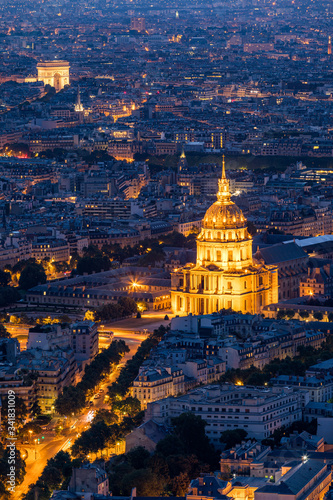 Paris aerial with Les Invalides, France. Twilight aerial view of Paris, France from Montparnasse Tower with Les Invalides building and Arc de Triomphe. Beautiful Les Invalides in Paris, France © daliu
