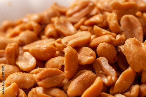 Quadro em tela Close up shot of salted peanuts
