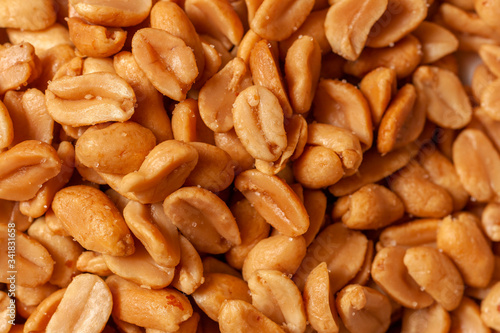 Quadro em tela Close up shot of salted peanuts
