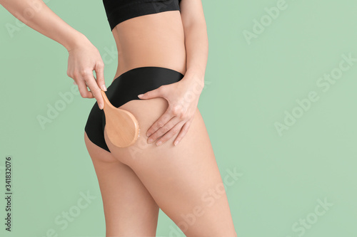 Woman with anti-cellulite m...
