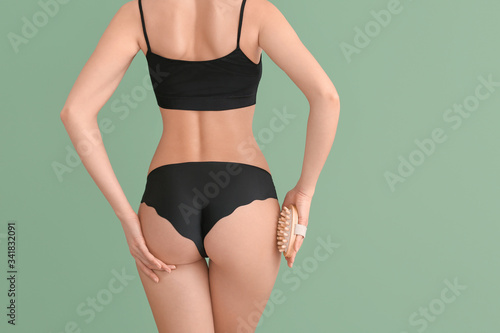 Woman with anti-cellulite m...