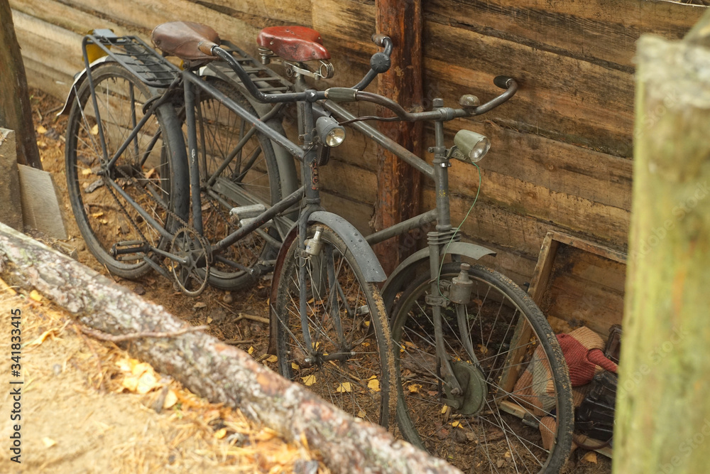 old bicycle in front of a brick wall old bicycle in front of a brick wall