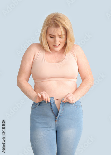 Troubled overweight woman o...