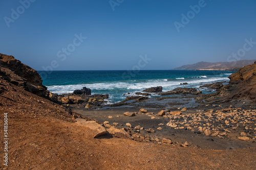 La Pared volcanic beach or Playa de La Pared on Fuerteventura south west coast  Canary Islands  Spain  with eroded landscape and black sand. October 2019