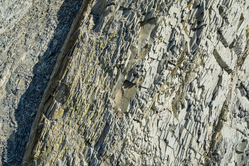 Natural stones and rock fragments of different sizes on the mountain ...