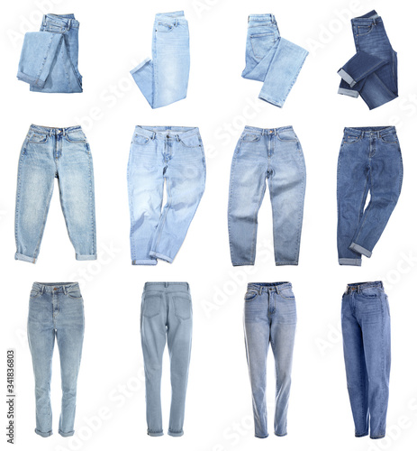 Set with different jeans on white background photo